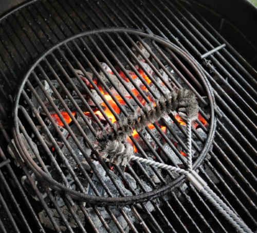 Charcoal setup with drip pan in the middle to retain moisture