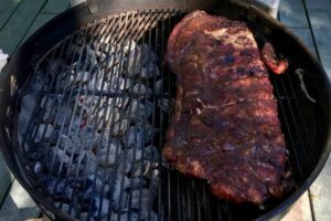 Two zone grilling method for charcoal BBQ